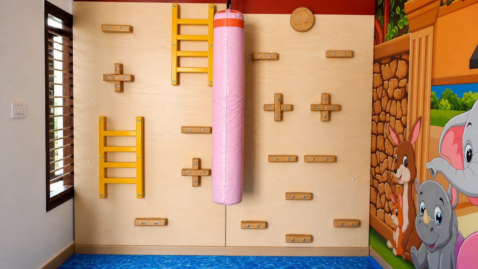 Jungle-themed soft play structure with slides at Navashiksha HSR Layout